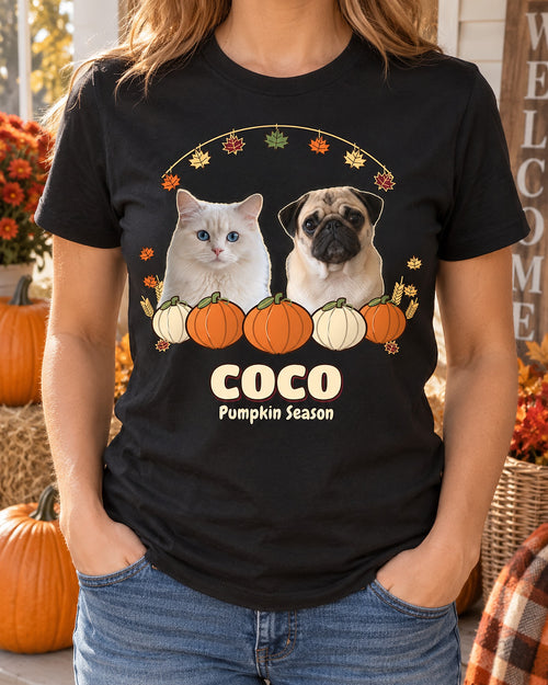 Black personalized pumpkin dog shirt worn on an autumn porch, showing a pug and white cat behind five pumpkins with the name COCO and Pumpkin Season.