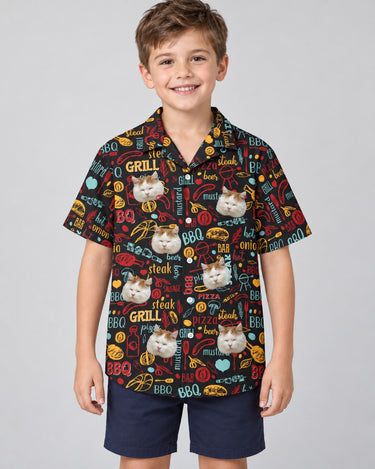 BBQ Royale Night Hawaiian shirt with printed faces, worn by a child