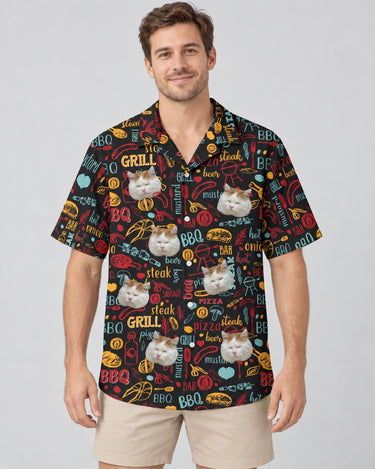 BBQ Royale Night Hawaiian shirt with printed faces, worn by a man