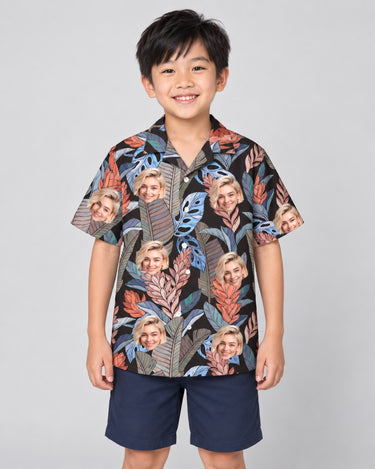 Bird of Paradise Silk Tropical Hawaiian shirt with printed faces, worn by a child