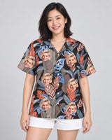 Bird of Paradise Silk Tropical Hawaiian shirt with printed faces, worn by a woman