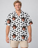 Black Cat Silhouette Halloween Hawaiian shirt with printed faces, worn by a man