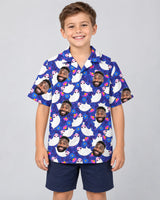 Boo Ghost Halloween Hawaiian shirt with printed faces, worn by a child