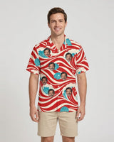 Candy Cane Tide Christmas Hawaiian Shirt with printed faces, worn by a man