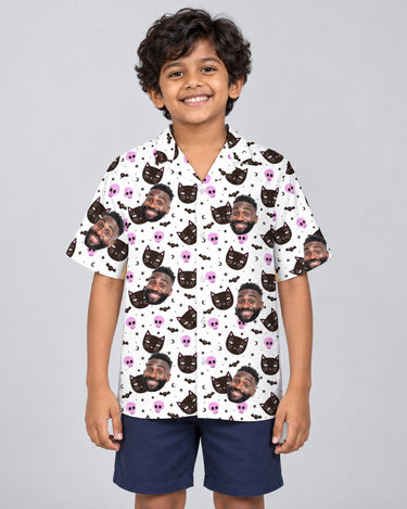Cat and Pumpkin Halloween Hawaiian shirt with printed faces, worn by a child