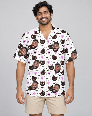Cat and Pumpkin Halloween Hawaiian shirt with printed faces, worn by a man