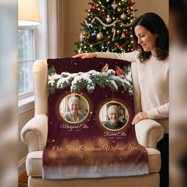 Daughter with a personalized memorial blanket for her late parents, Our First Christmas Without You, with a pair of cardinals