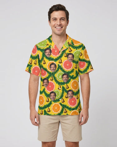 Citrus Garland Christmas Hawaiian Shirt with printed faces, worn by a man