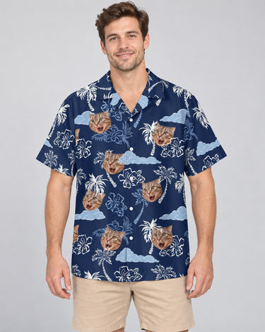 Coconut Palm Delight Hawaiian shirt with printed faces, worn by a man