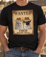 Black western pet photo tee on an adult beside a ranch fence, showing a cowboy-hatted pug and white cat on an aged Wanted poster with the name COCO.