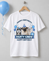 White pet birthday tee on a wooden hanger with three pets in striped party hats, blue and silver balloons, age 3 and Party Crew lettering.