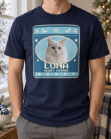 Navy custom cat Christmas tee showing Luna in an Icy Blue knit-style oval frame, with cream pixel letters, snowflakes and reindeer