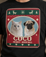 Close-up of a pug and white cat inside a cream stitched oval, tiny V stitches and pixel Coco lettering on a black Christmas pet tee