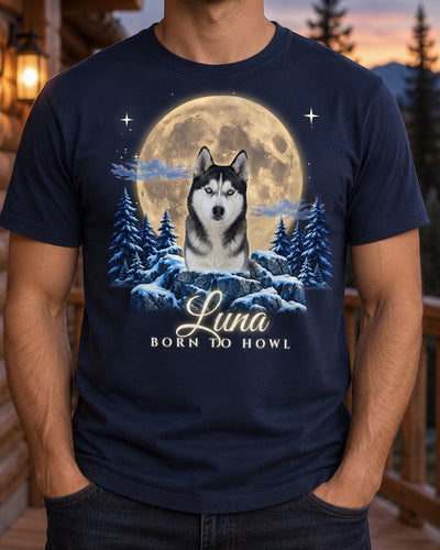 Man wearing a navy custom dog moon t-shirt with a husky on a snowy rock in front of a huge full moon and the name Luna in glowing script