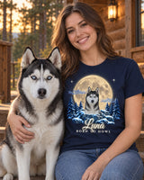 Smiling woman with her husky on cabin porch steps, wearing a navy pet moon t-shirt that shows the same dog under a full moon