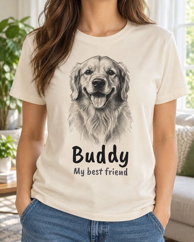 Woman wearing a natural cream custom dog sketch t-shirt with a pencil portrait of a golden retriever and the name Buddy in handwritten marker lettering