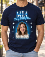 Man wearing a navy custom face bootleg rap tee with a woman's portrait in an ice blue glow and the name Mia