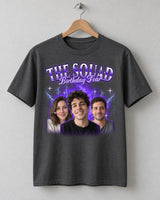 Charcoal custom face collage t-shirt on a wooden hanger with three big faces in a purple glow and the name The Squad