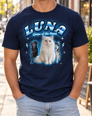 Man wearing a navy pet bootleg t-shirt with the name Luna in ice blue lettering and a white cat, a black Labrador and a husky with a blue glow