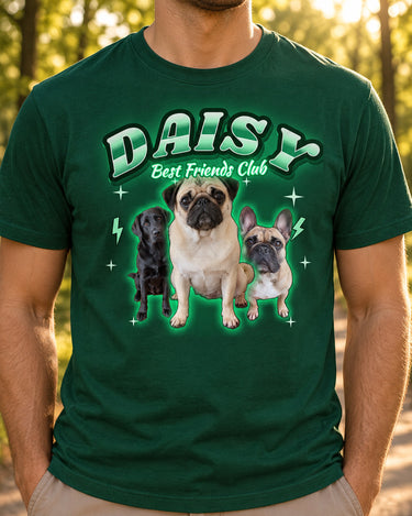 Man wearing a forest green pet bootleg t-shirt with the name Daisy in neon green lettering and a pug, a black Labrador and a French bulldog