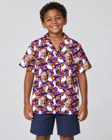 Cute Ghost Halloween Hawaiian shirt with printed faces, worn by a child