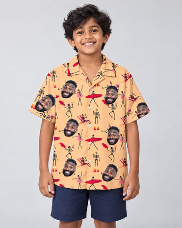 Dead Surfer Skeleton Hawaiian shirt with printed faces, worn by a child
