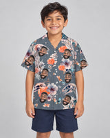 Dino Flower Floral Hawaiian shirt with printed faces, worn by a child