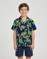 Dino Lights Dinosaur Christmas Hawaiian Shirt with printed faces, worn by a child
