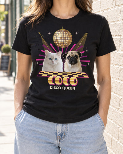 Black custom disco pet photo shirt worn on a bright city street, showing a pug and white cat beneath a gold mirror ball with the name Coco.
