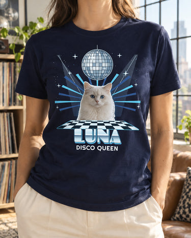 Navy disco cat photo tee in a bright loft, featuring a white cat, a silver mirror ball, an ice-blue dance floor and the name Luna.