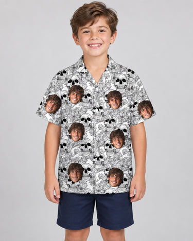 Edgy Skull Surf Hawaiian shirt with printed faces, worn by a child