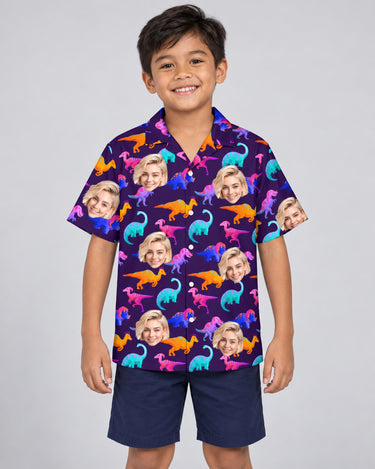 Electric Neon Dinosaur Hawaiian shirt with printed faces, worn by a child
