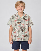 Exotic Jungle Hawaiian shirt with printed faces, worn by a child