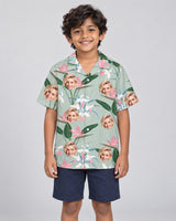 Exotic Orchid Silk Tropical Hawaiian shirt with printed faces, worn by a child