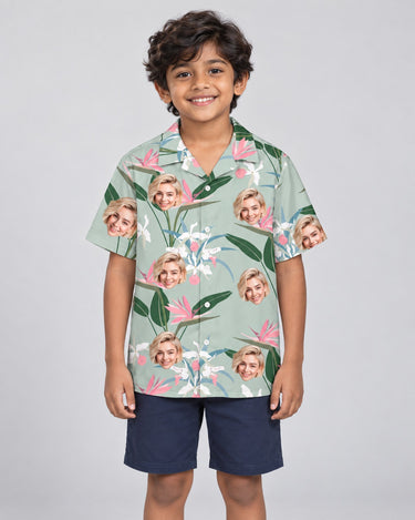 Exotic Orchid Silk Tropical Hawaiian shirt with printed faces, worn by a child