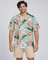 Exotic Orchid Silk Tropical Hawaiian shirt with printed faces, worn by a man