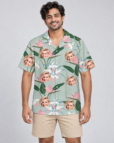 Exotic Orchid Silk Tropical Hawaiian shirt with printed faces, worn by a man