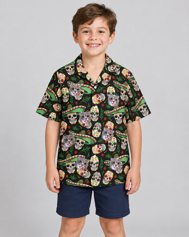 Fiesta Skull Vibes Hawaiian shirt with printed faces, worn by a child