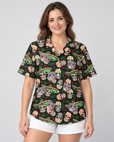 Fiesta Skull Vibes Hawaiian shirt with printed faces, worn by a woman