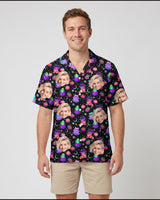 Floral Ghost Halloween Hawaiian shirt with printed faces, worn by a man