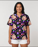 Floral Ghost Halloween Hawaiian shirt with printed faces, worn by a woman