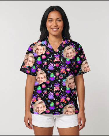 Floral Ghost Halloween Hawaiian shirt with printed faces, worn by a woman