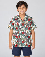 Floral Macaw Magic Hawaiian shirt with printed faces, worn by a child