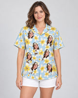 Frangipani Paradise Hawaiian shirt with printed faces, worn by a woman