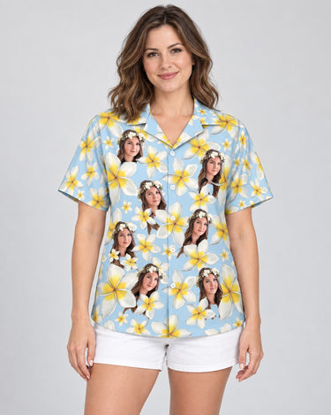 Frangipani Paradise Hawaiian shirt with printed faces, worn by a woman