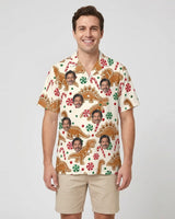 Gingerbread Dinosaur Christmas Hawaiian Shirt with printed faces, worn by a man