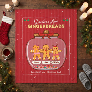 Gingerbread cookie jar blanket laid flat on a wooden floor with Christmas stocking and candles