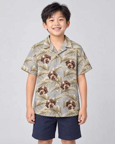 Golden Palm Leaves Hawaiian shirt with printed faces, worn by a child