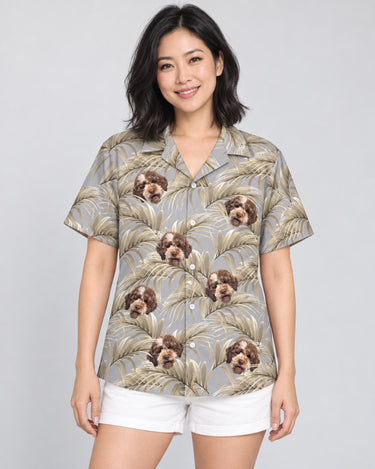 Golden Palm Leaves Hawaiian shirt with printed faces, worn by a woman