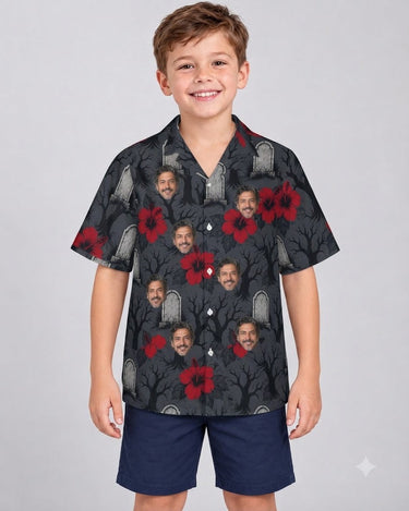 Graveyard Hibiscus Goth Hawaiian Shirt with printed faces, worn by a child